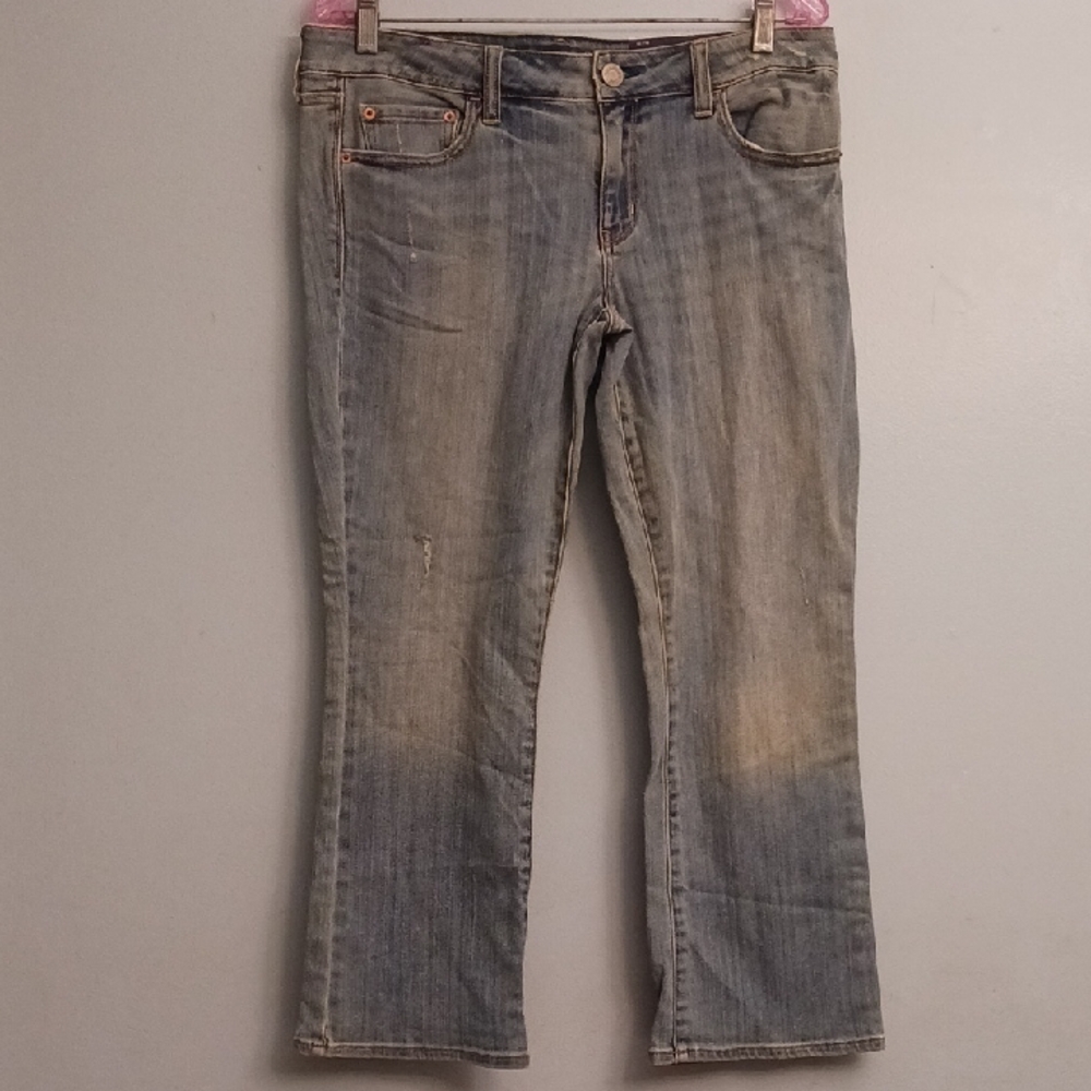 American Eagle size 12R women's low rise flare crop distressed light wash jeans.